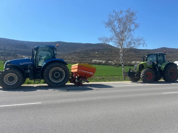 Tractors parked on rural road in Gradishte, Bulgaria