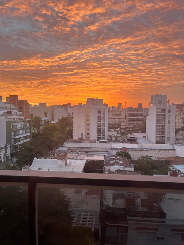 Sunset illuminates Córdoba skyline with orange mammatus clouds
