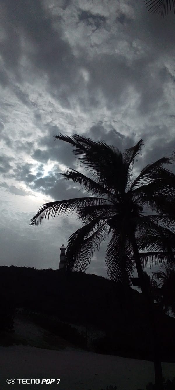 Storm clouds gather over lighthouse in Pedro González, Venezuela