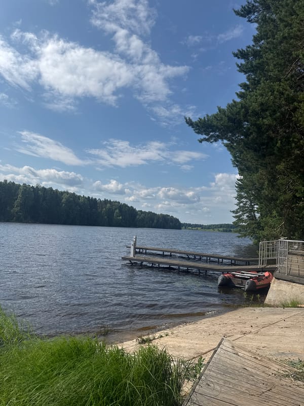 Lazy summer afternoon at a Russian lakeside dock