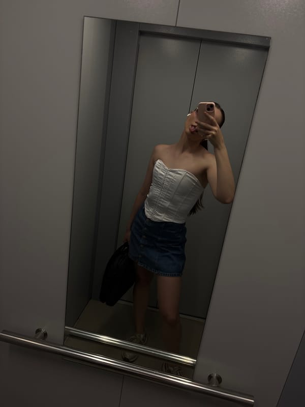 Mirror selfies, white top and dark bottoms, minutes apart