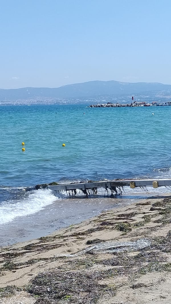 Quiet summer morning at a beach in Neoi Epivates, Greece