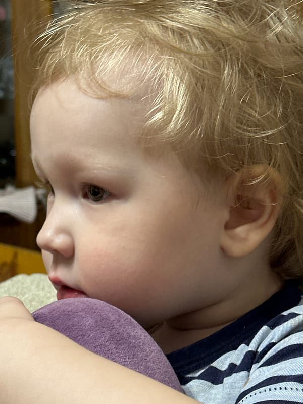 Mother and child share playful moments in Votkinsk home