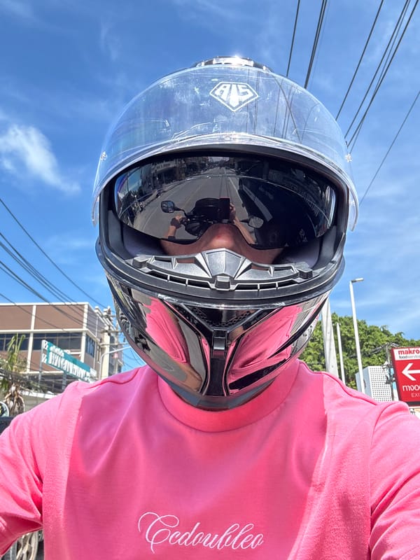 Motorcycle helmet selfies with reflective visor shots on Koh Phangan