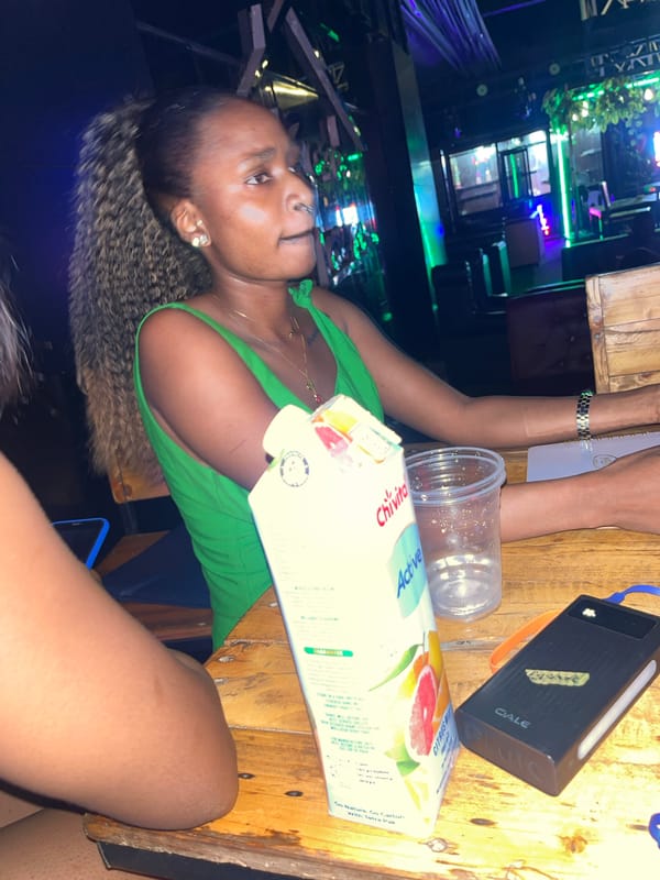 Evening out at a lit-up lounge in Howayi, Nigeria