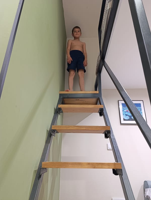 Moscow family captures playful moments with children on stairs