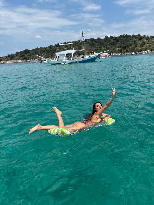 Lazy afternoon float on turquoise Greek waters