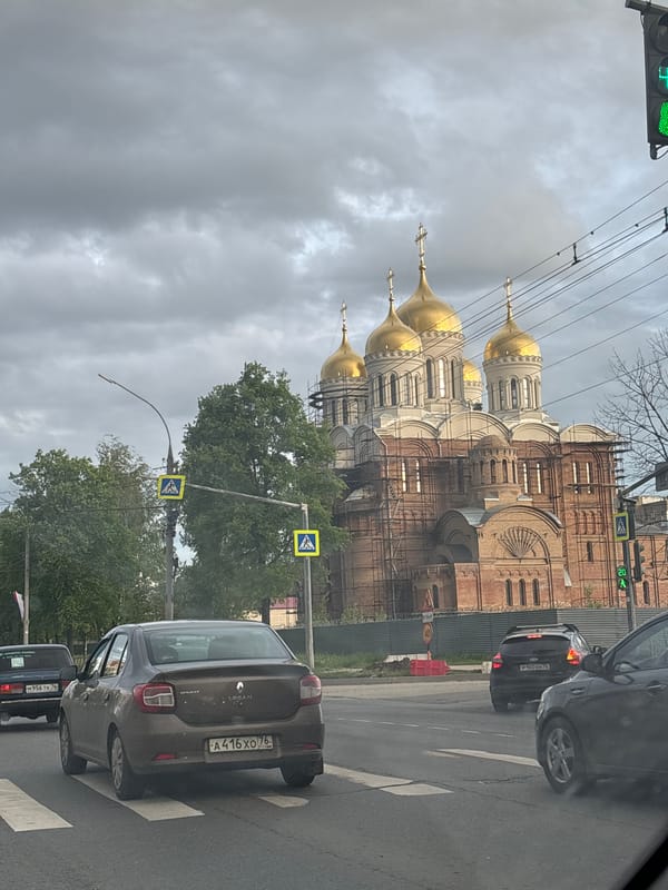 Couple enjoys fast food during afternoon drive through rural Russia