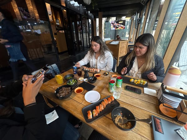 Women enjoy sushi dinner at Mexico City restaurant