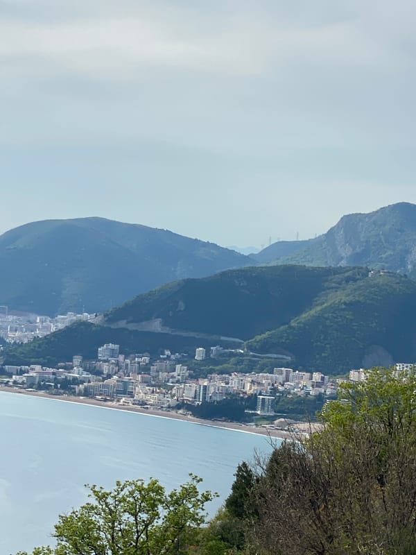 Tourists document scenic Adriatic views from Čelobrdo overlook Montenegro