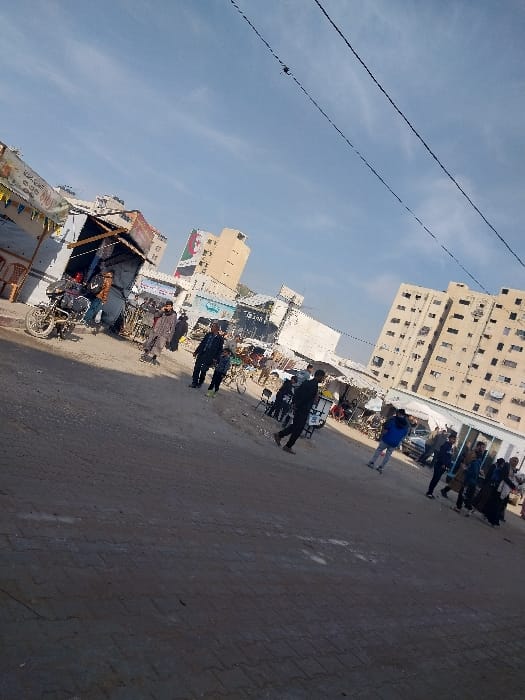 Daytime street scene documented in Gaza under clear skies