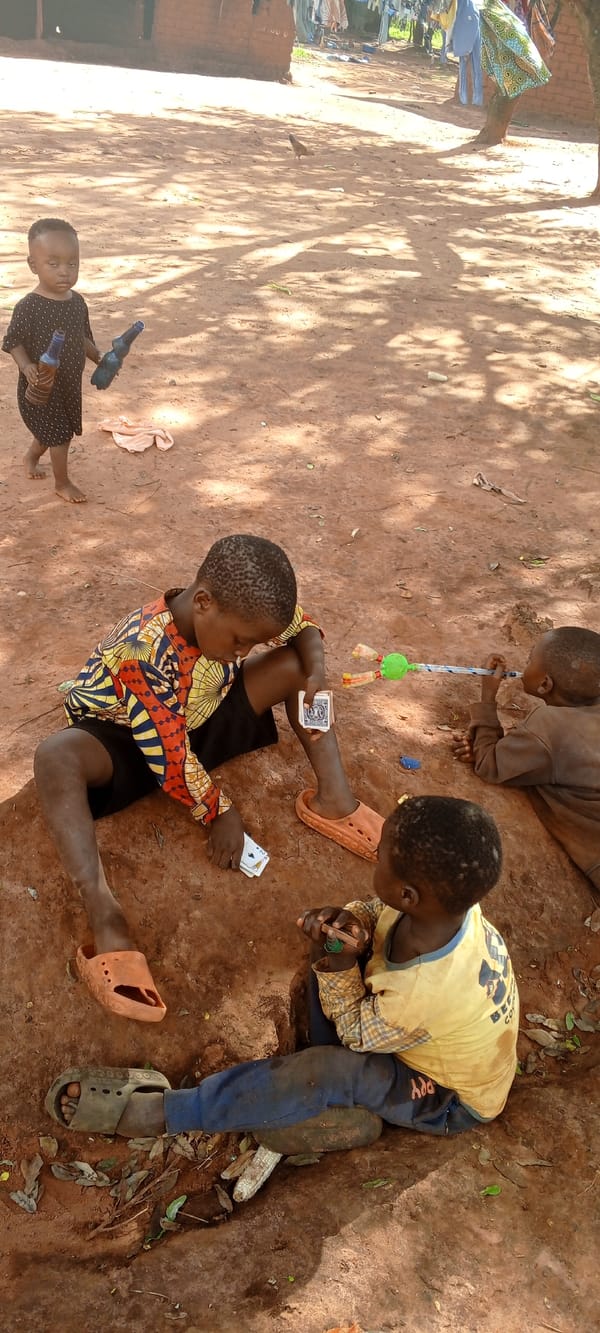 Children play traditional games in rural Democratic Republic Congo