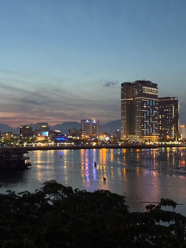 Da Nang's Han River waterfront at sunset and nightfall