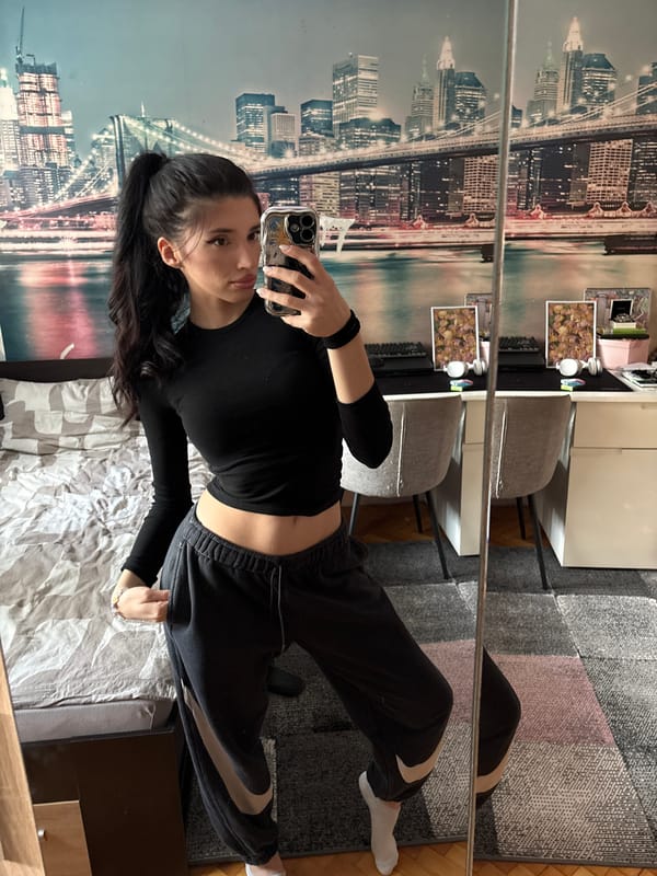 Woman takes multiple mirror selfies in different outfits, Sofia