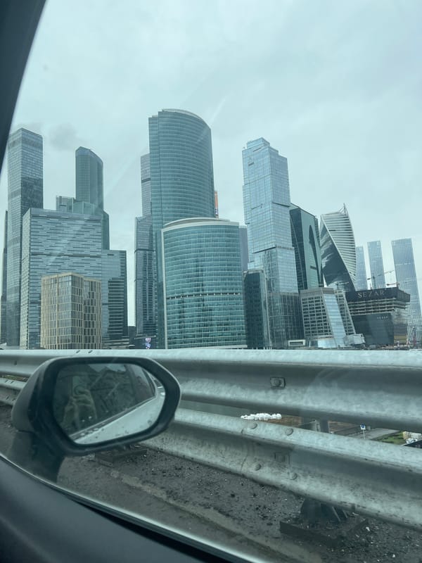 Traveler photographs Moscow City skyscrapers from moving vehicle