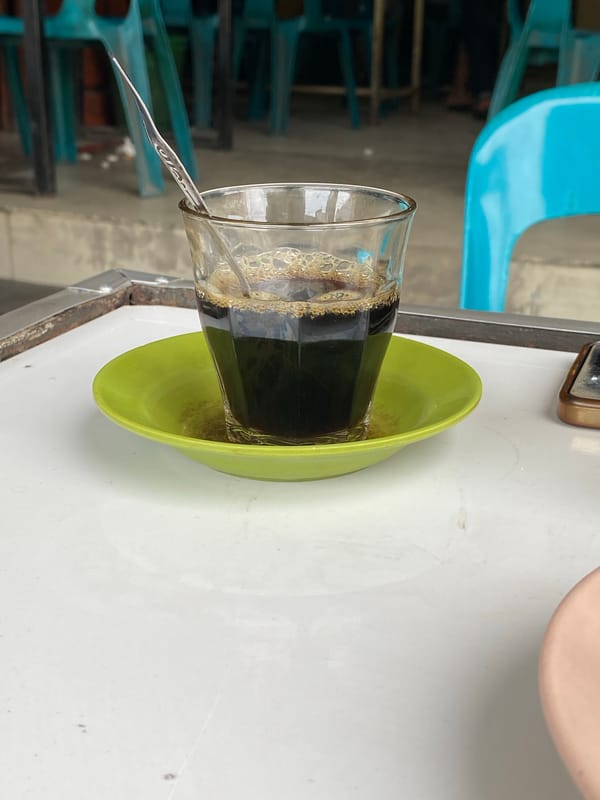 Morning coffee and prayers at a Lhokseumawe warung