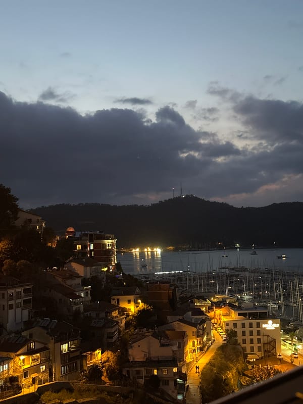 Evening views captured of illuminated Fethiye harbor, Turkey