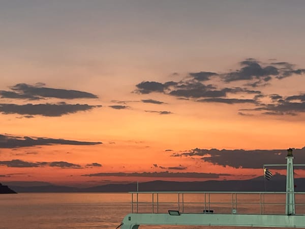 Sunset over the Thassian Sea from a ferry deck