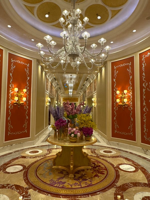 Ornate ceiling fresco documented in luxury Macao interior