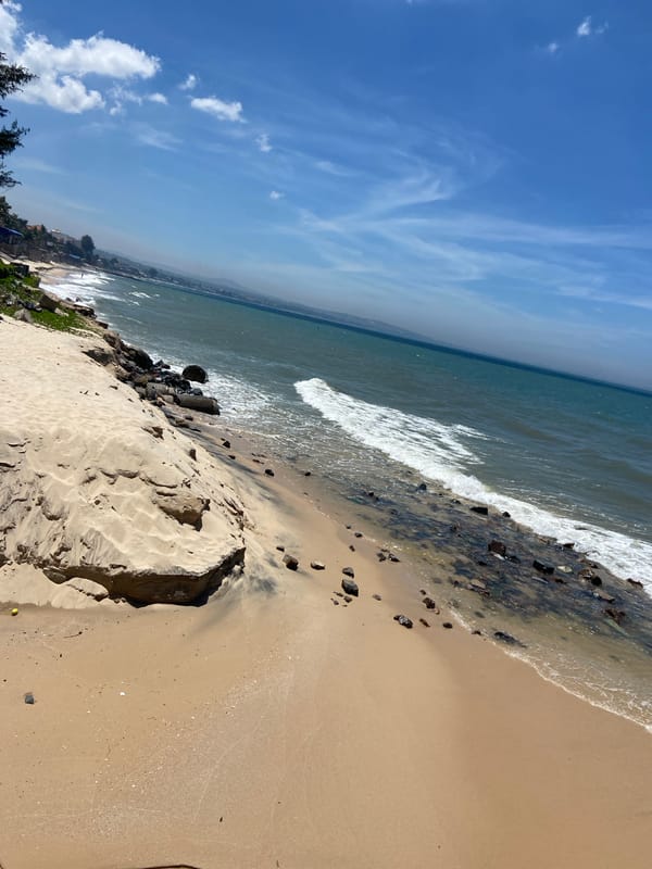 Phu Thuy coastline: beach debris, collapsed buildings, resort life
