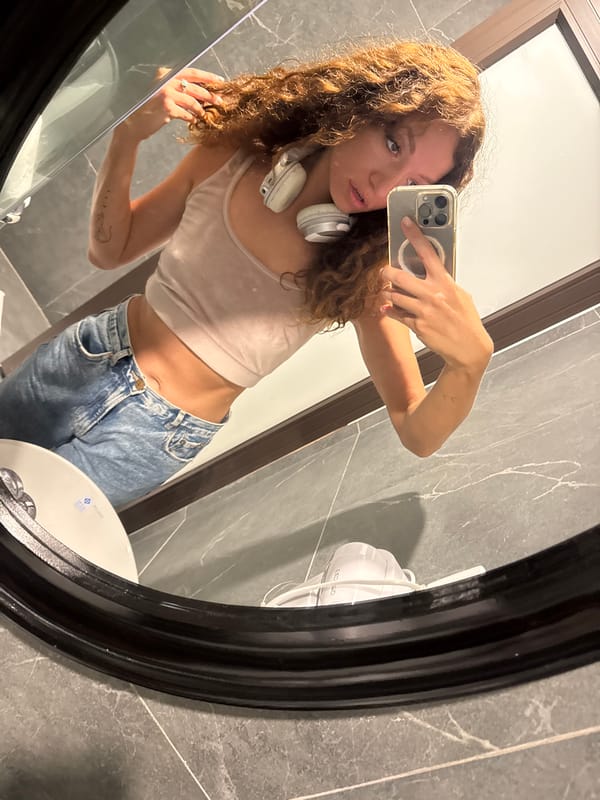 Woman takes bathroom selfie in Hanoi early morning
