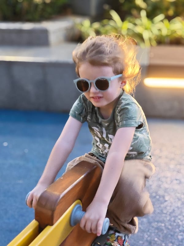 Father-child bonding moments captured at Mumbai residential complex playground