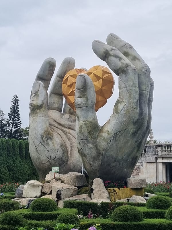 Exploring Bà Nà Hills' gardens, statues, and misty hilltop views