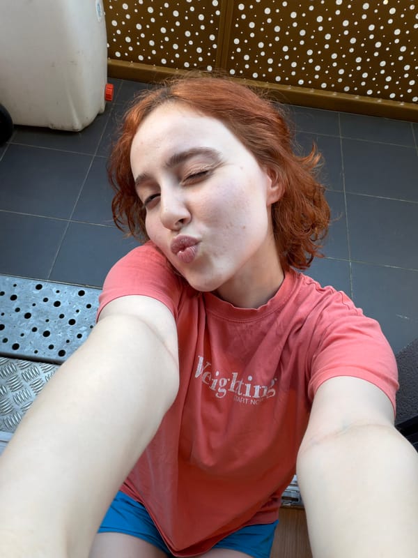 Woman takes playful selfies in multiple poses in Strasbourg
