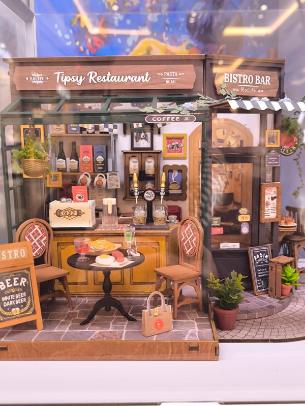 Restaurant establishment with diorama display observed in Riga