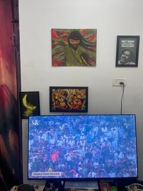 Interior wall display captured in Morjim featuring art, TV