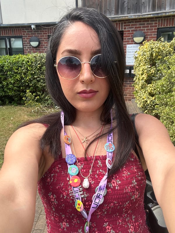 Woman photographed with sunglasses in Epsom and Ewell