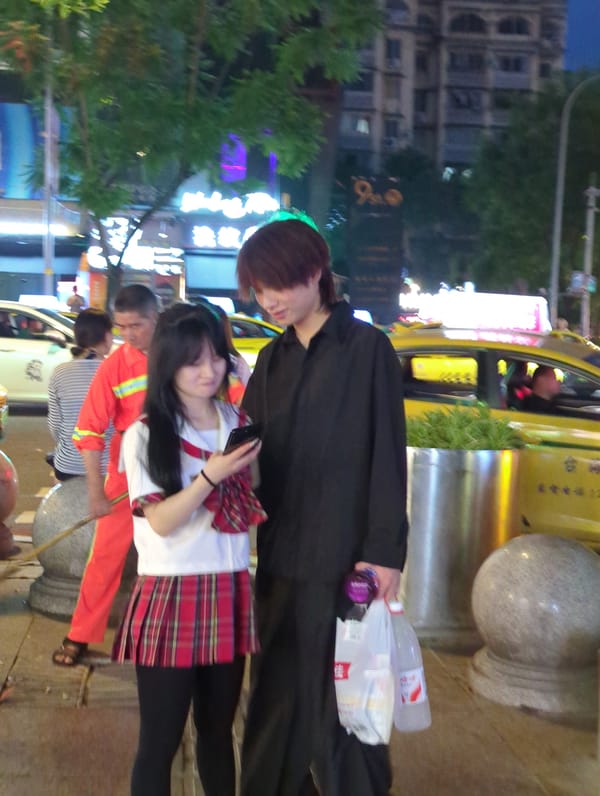 Night market energy across Longta and Liangjiang streets