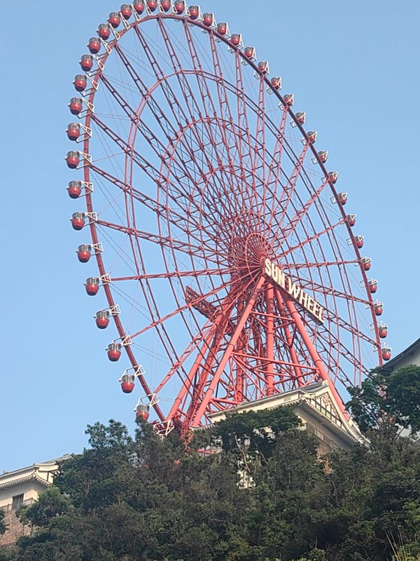 Motorcyclist crosses bridge in Hong Gai Ward, Vietnam