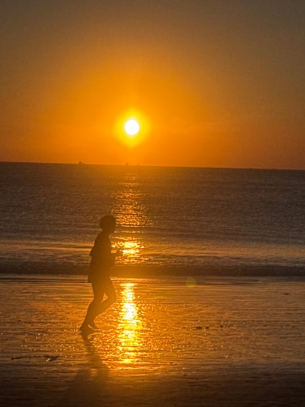 Beach activities captured during golden hour in Kuta Selatan