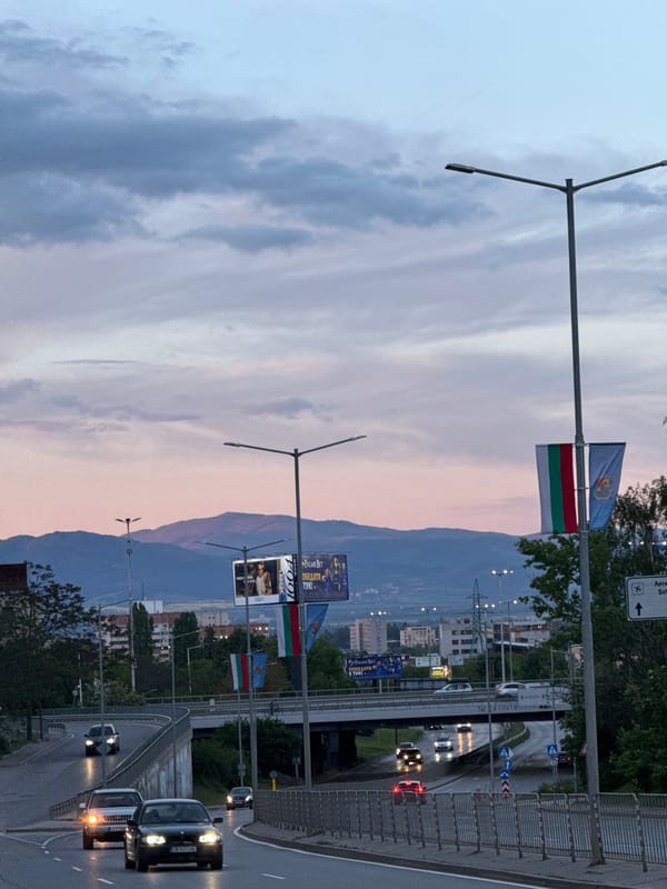 Evening traffic captured near McDonald's during Sofia sunset