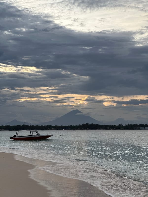 Man observed on boat deck off Indonesian volcanic coast
