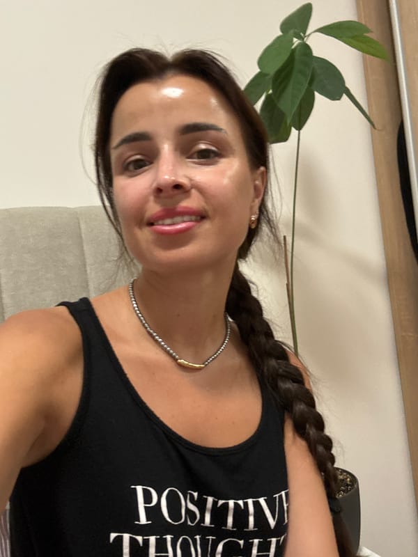 Quick selfie session in a grey chair, playful and casual