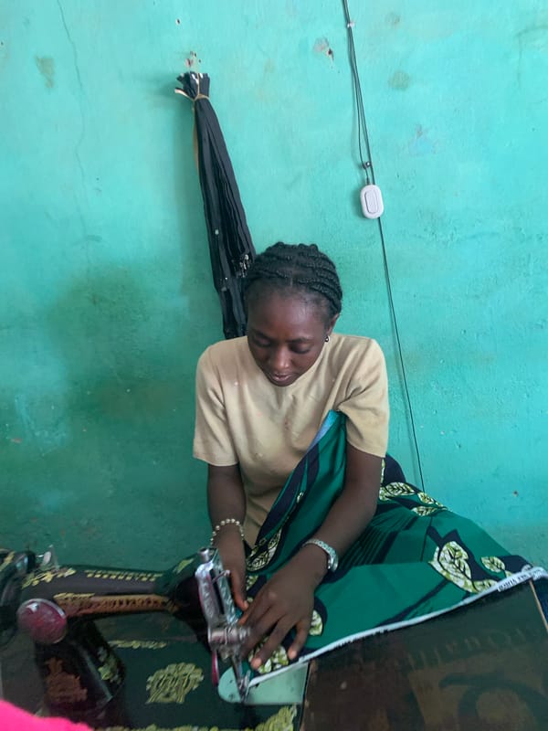 Women conduct textile work in Maigizo village, Nigeria