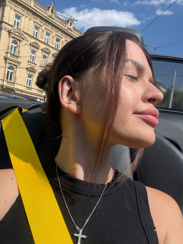 Sunny convertible ride through Prague, catching some rays