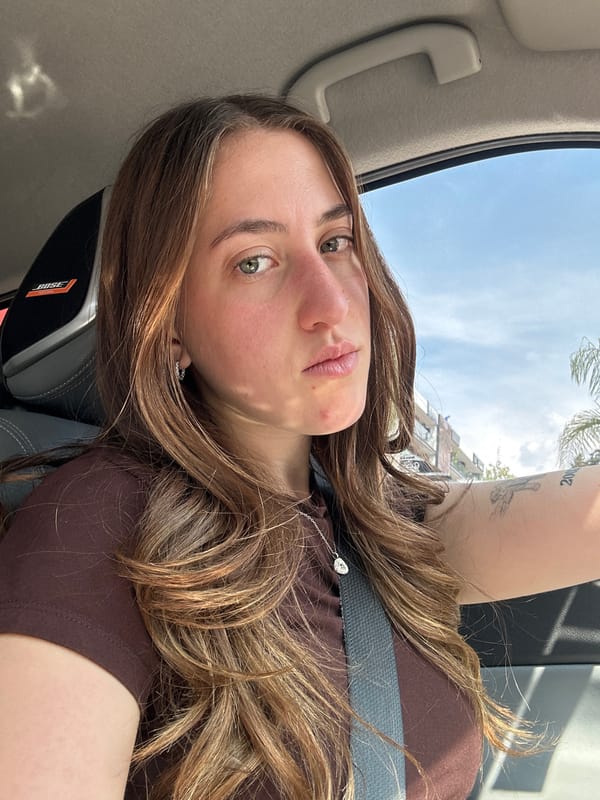 Woman takes car selfies in Huixquilucan traffic Monday evening
