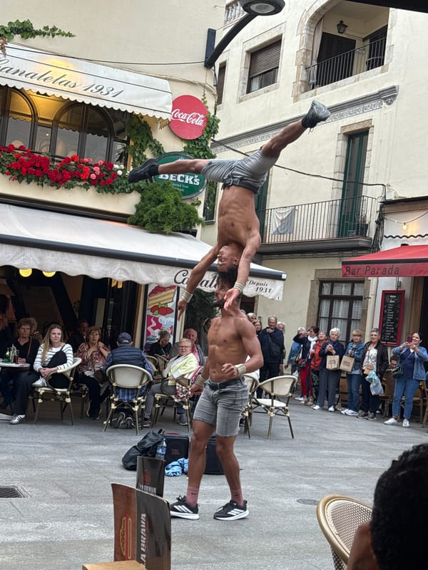 Street acrobats draw crowds in Lloret de Mar square