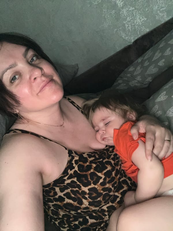 Casual indoor moment captured between two people in Noviy