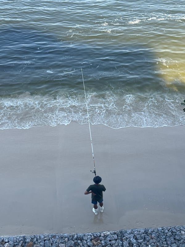 Lazy afternoon fishing scene at Jurujuba beach, Niterói