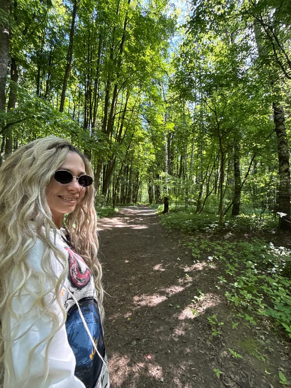 Woman photographed on forest path in Rusanovo, Russia
