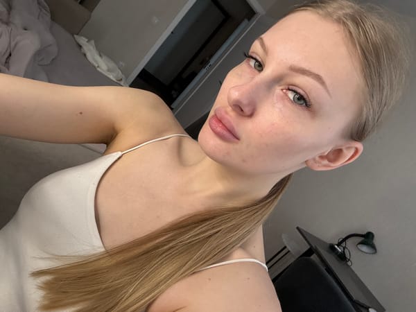 Woman takes selfies in Perm apartment early morning