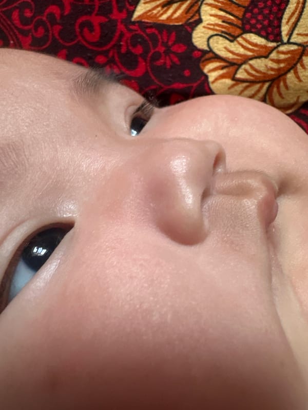 Newborn at home in Kyrgyzstan, close-up moments and a gift basket