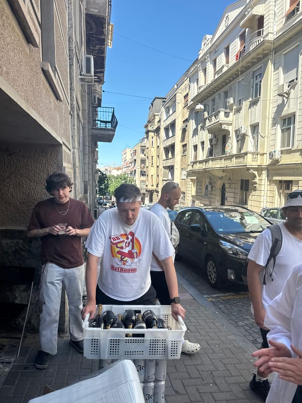 Beverage delivery operation captured on Belgrade street corner