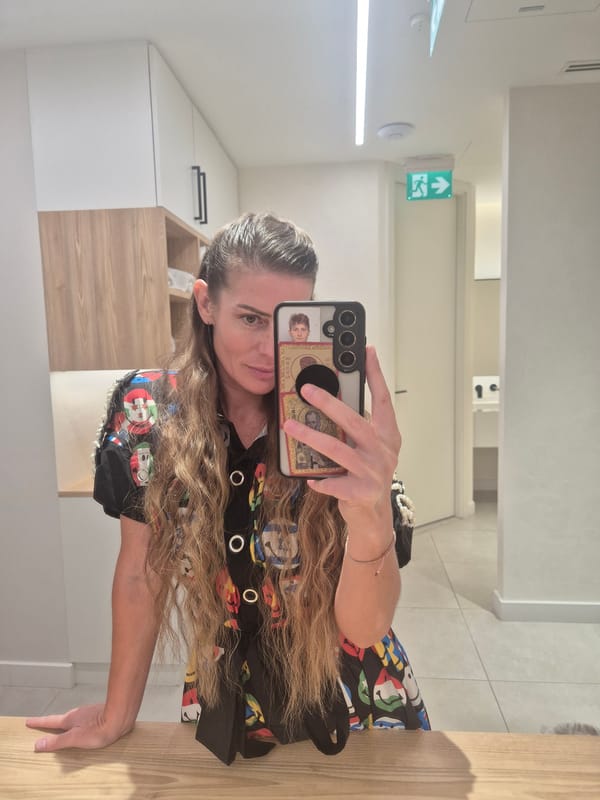 Woman Takes Mirror Selfie Indoors