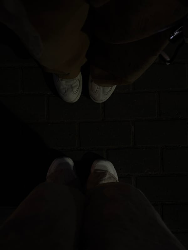 Two people in white sneakers photographed on Perm street