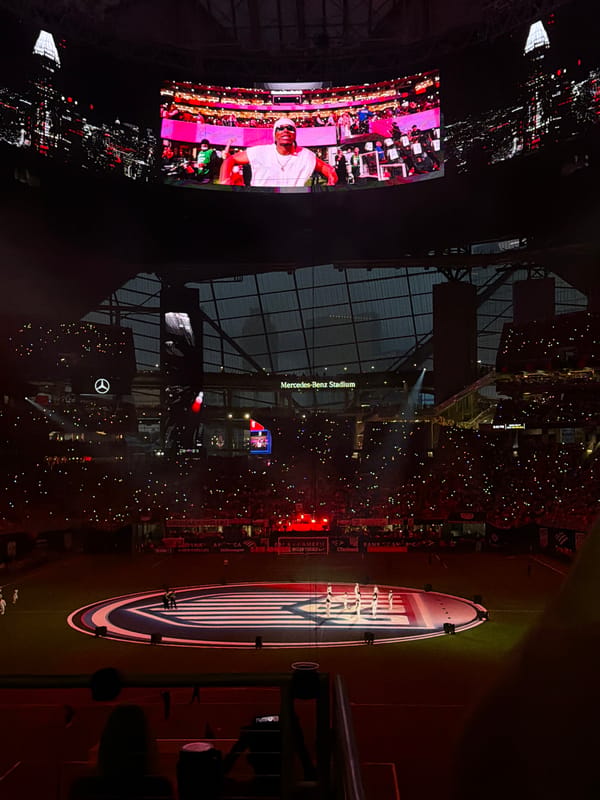Crowd with lights fills Mercedes-Benz Stadium in Atlanta